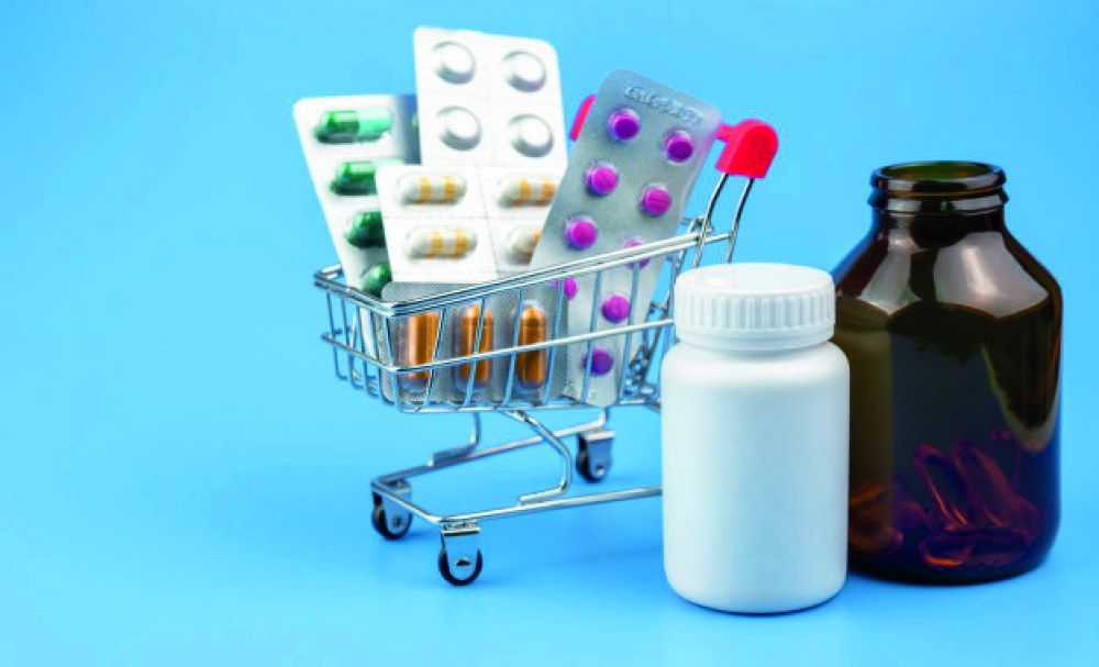 Prescription medications in a small shopping cart